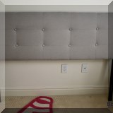 F86. Upholstered headboard. 